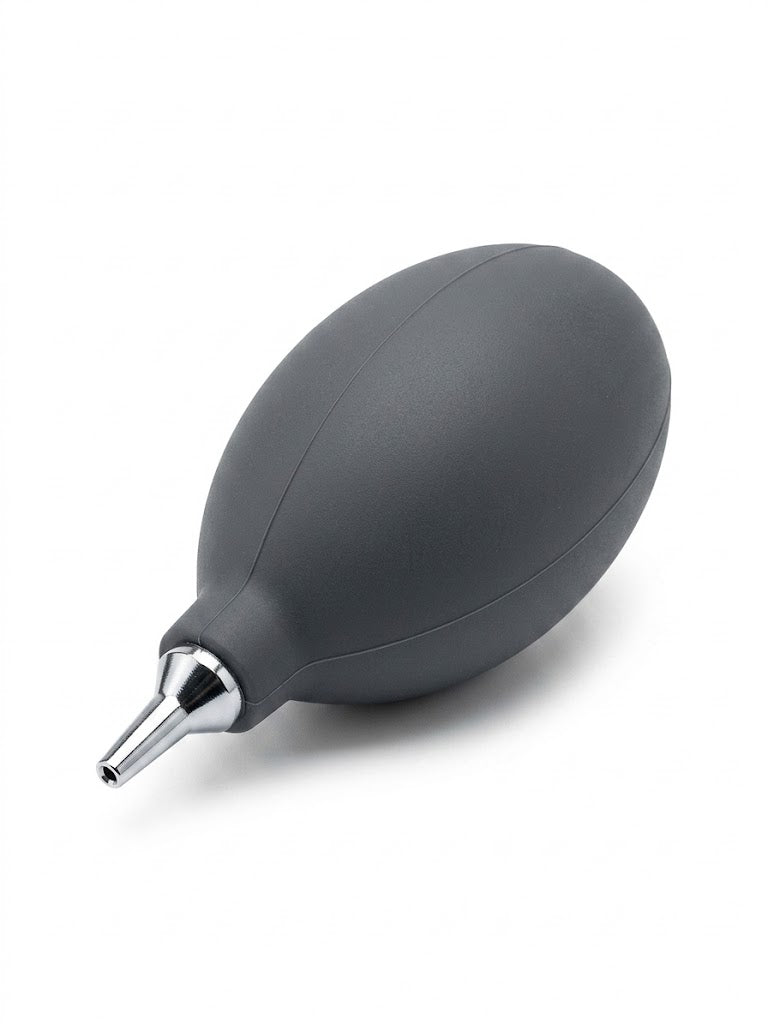 Hearing professionals cleaning pump/bellows for hearing aids